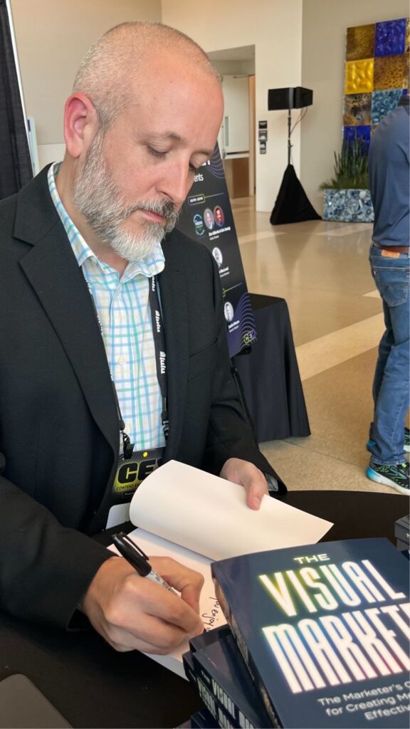 Jim signing at CEX
